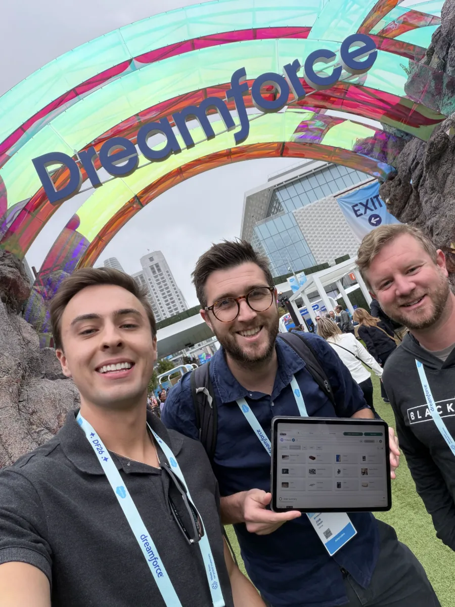 The Eposly team under the Dreamforce arch at Dreamforce 2026, with Joe holding an iPad
